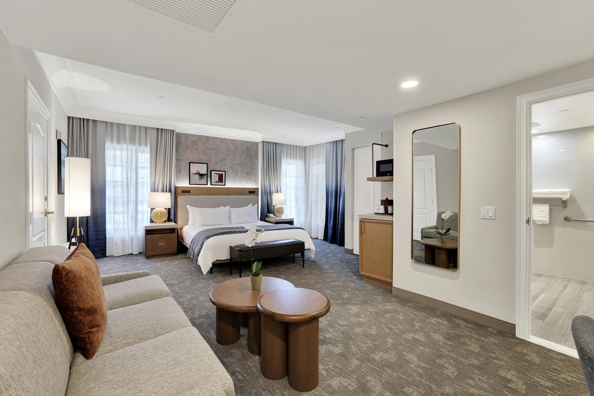 ADA guest room with a king bed and seating area