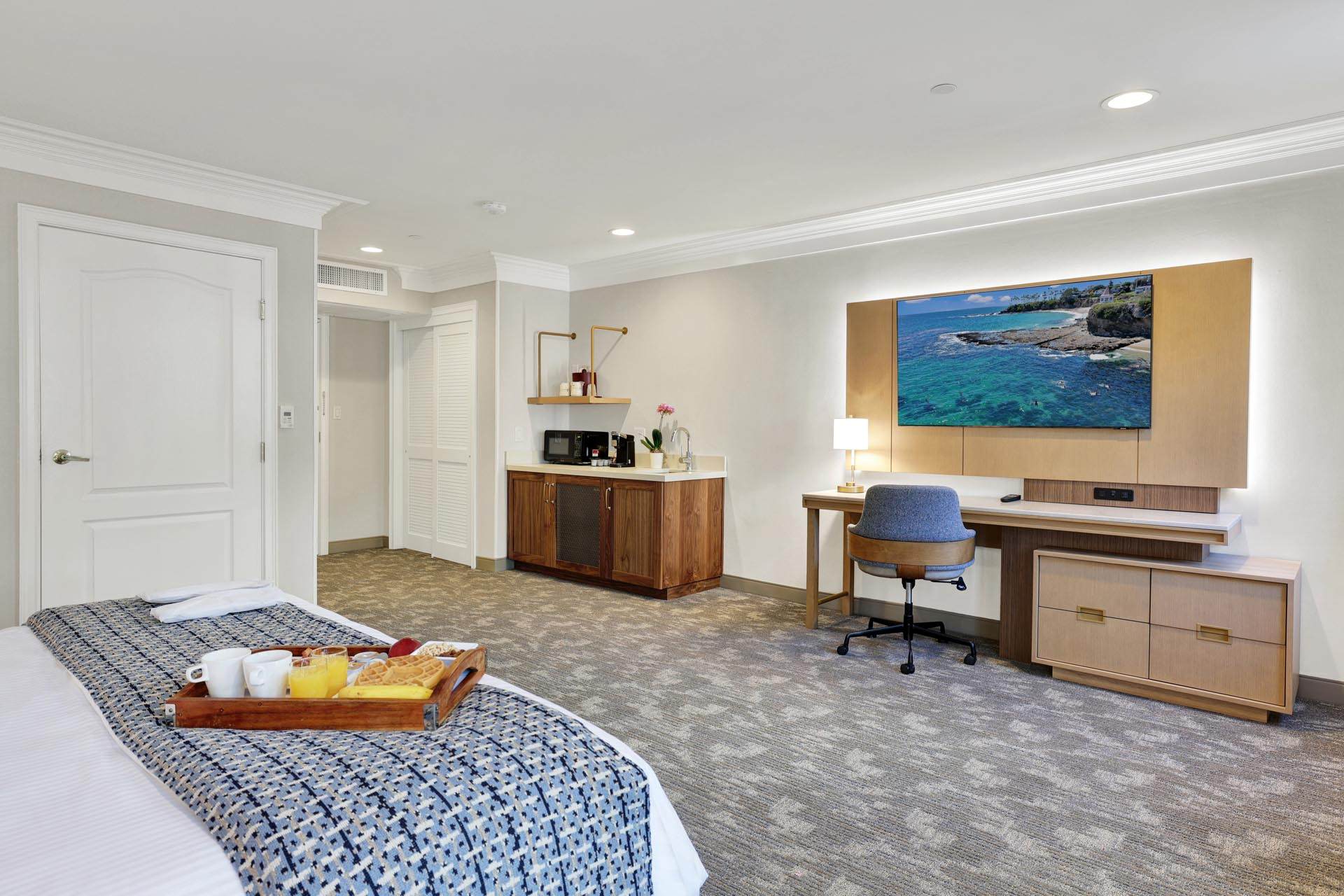 Spacious ADA room with a king bed and a desk